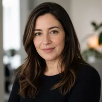 Professional author portrait of a person appearing approachable and intelligent in a neutral background.